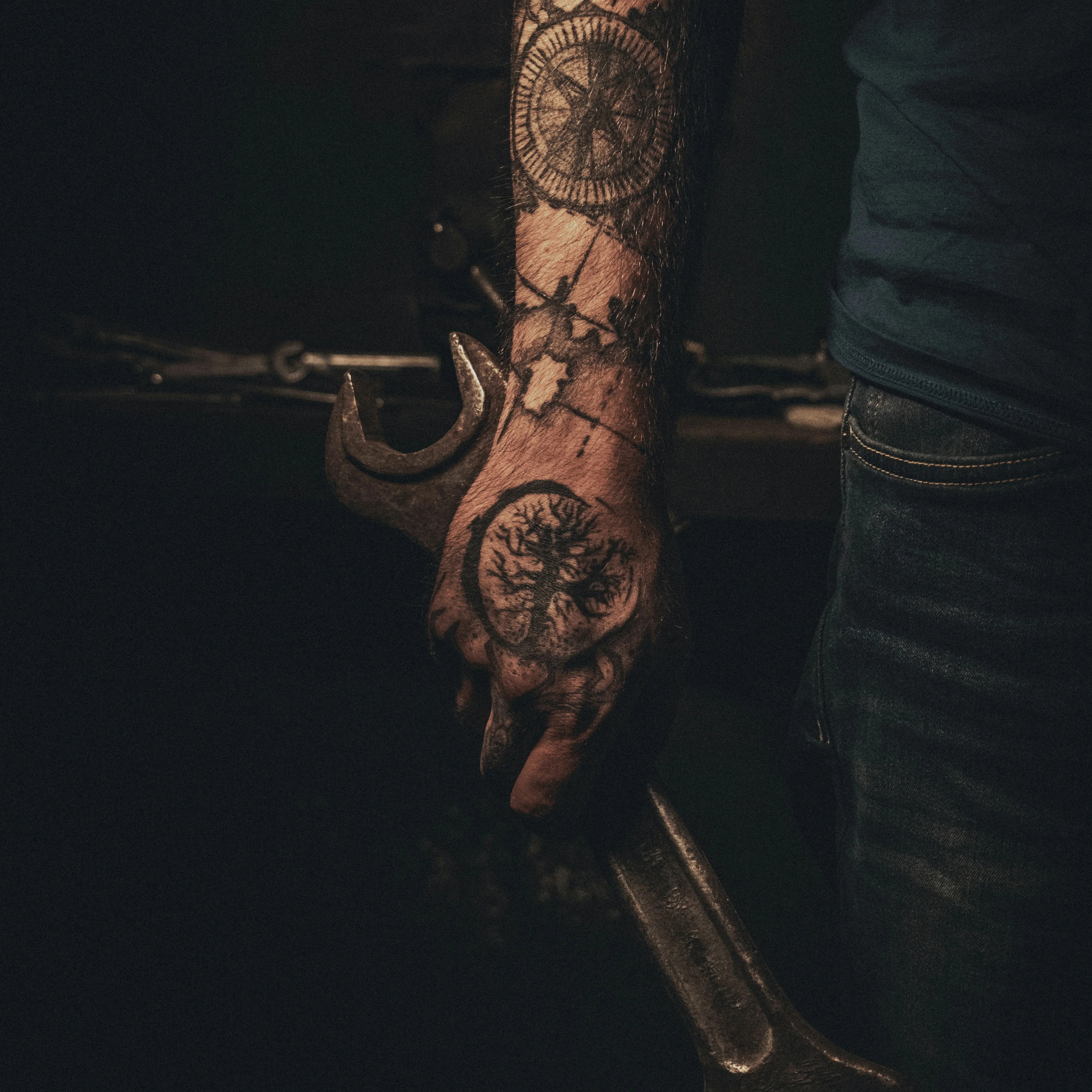 Professional Tattoo Artist Creating Hand Tattoo in Bangalore